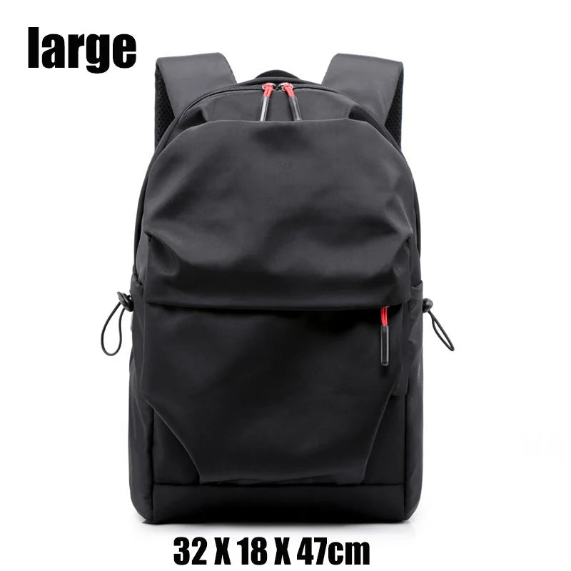 Durable nylon backpack in black and light grey with adjustable straps