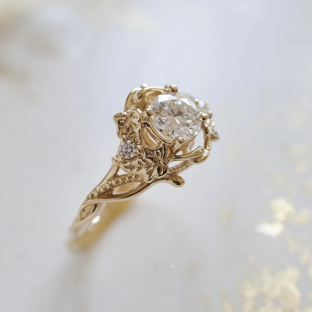 Gold alloy unisex ring with brushed finish on white background