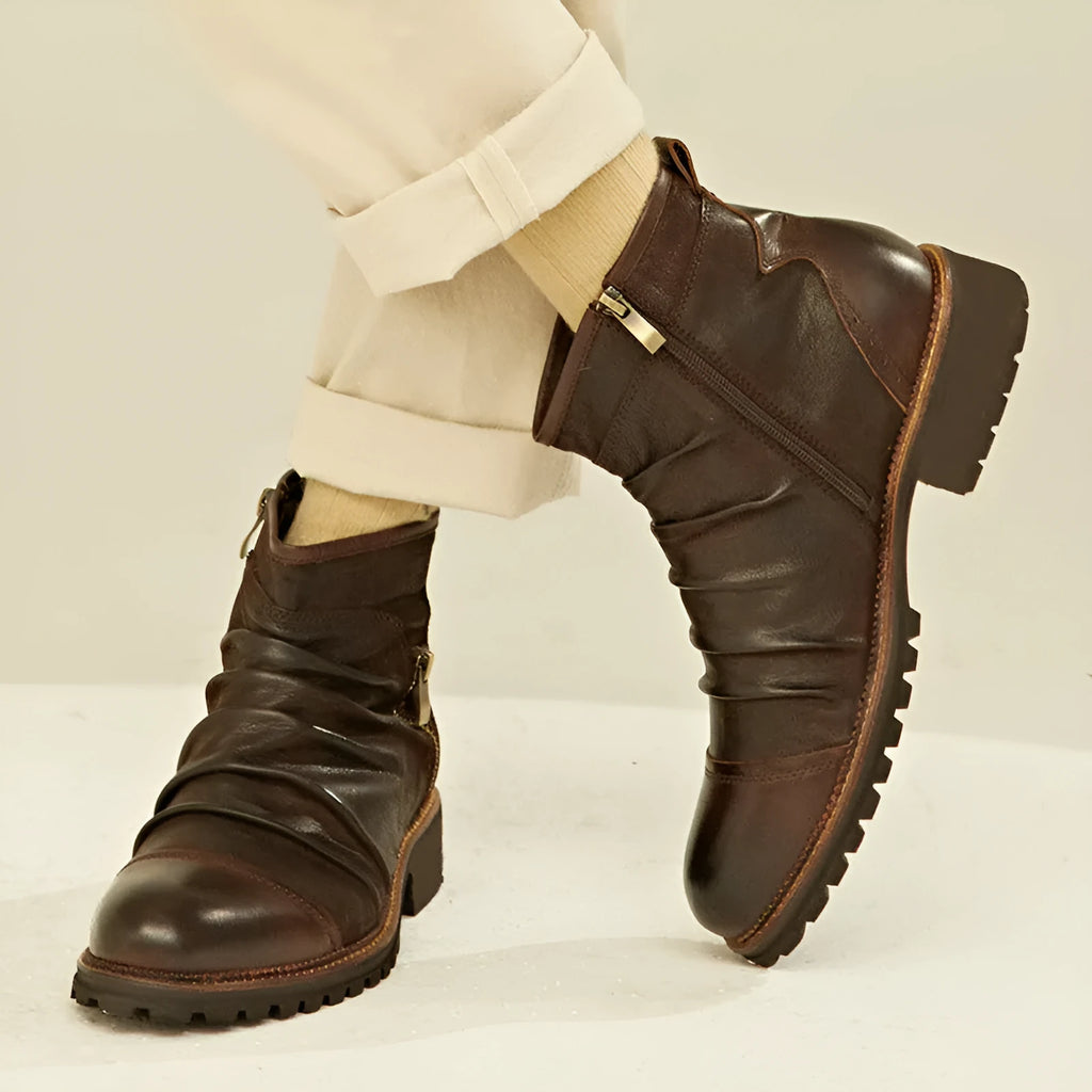 Black embossed PU Martin boots with a side zipper and a distinctive horseshoe heel.