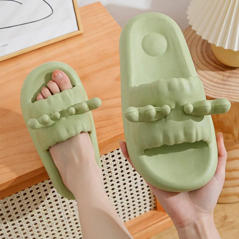 Women's flip-flop style slippers with deer horn design, shown in light yellow on a non-slip EVA sole.