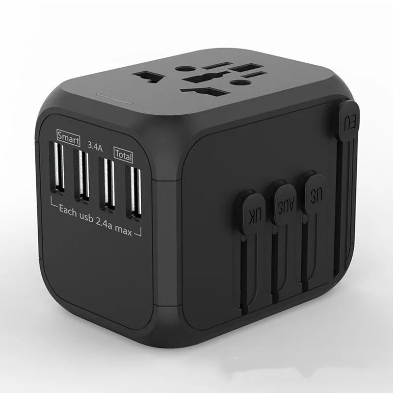Black international travel plug adaptor showing six conversion holes for different socket types