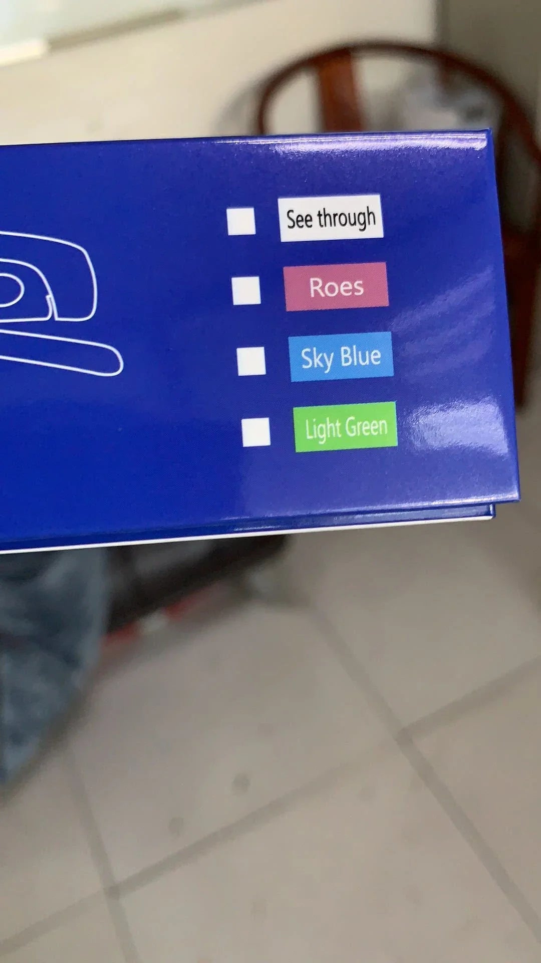 Head-mounted anti-fog and anti-spray mask in blue, green, and pink with replaceable lenses