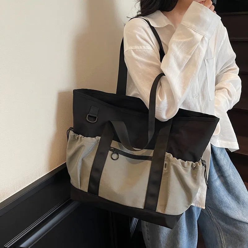 Women's lightweight grey yoga fitness travel bag with letter pattern and 36-55L capacity