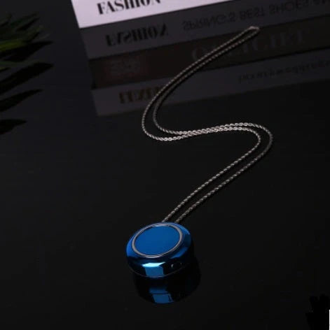 Portable negative ion air purifier necklace in blue, white, and silver options