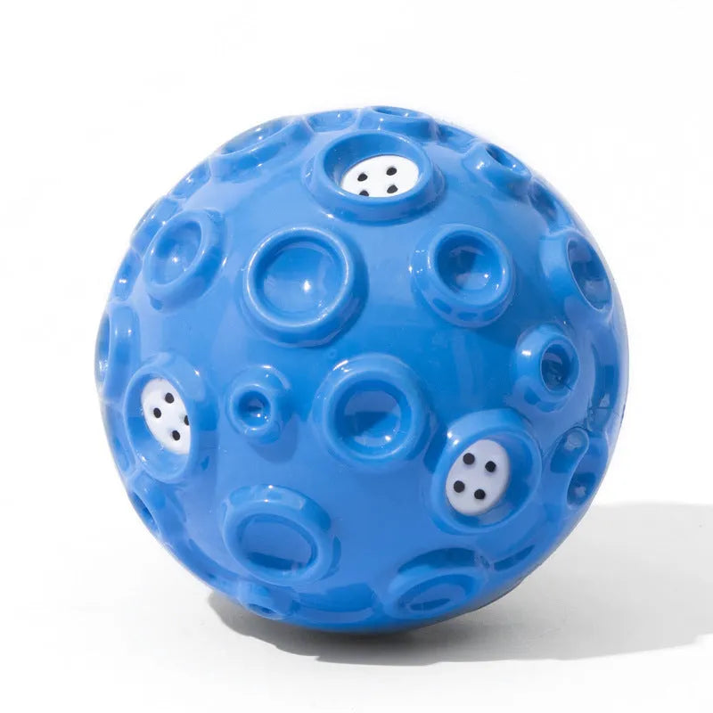 Coloured rubber dog toy ball with a bumpy surface for aggressive chewers and teeth cleaning.