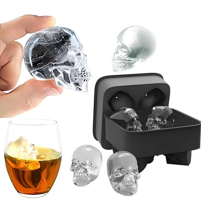 Black silicone ice cube tray with four skull-shaped cavities measuring 12cm long