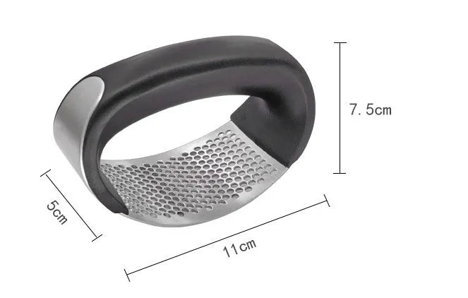 Silver 304 stainless steel garlic press with ergonomic ABS handle on a kitchen counter