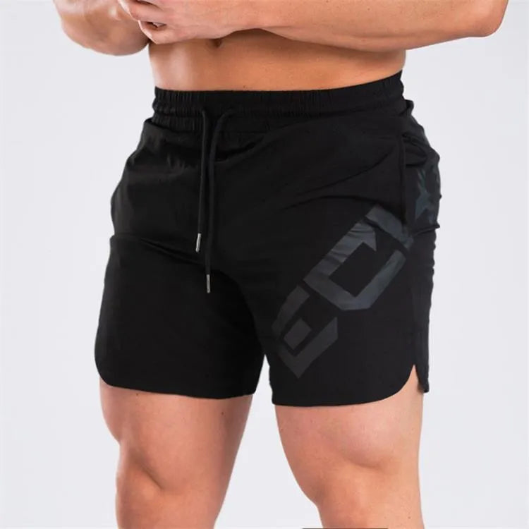 Men's black elastic nylon quick-dry running shorts on a mid-waist, knee-length model.