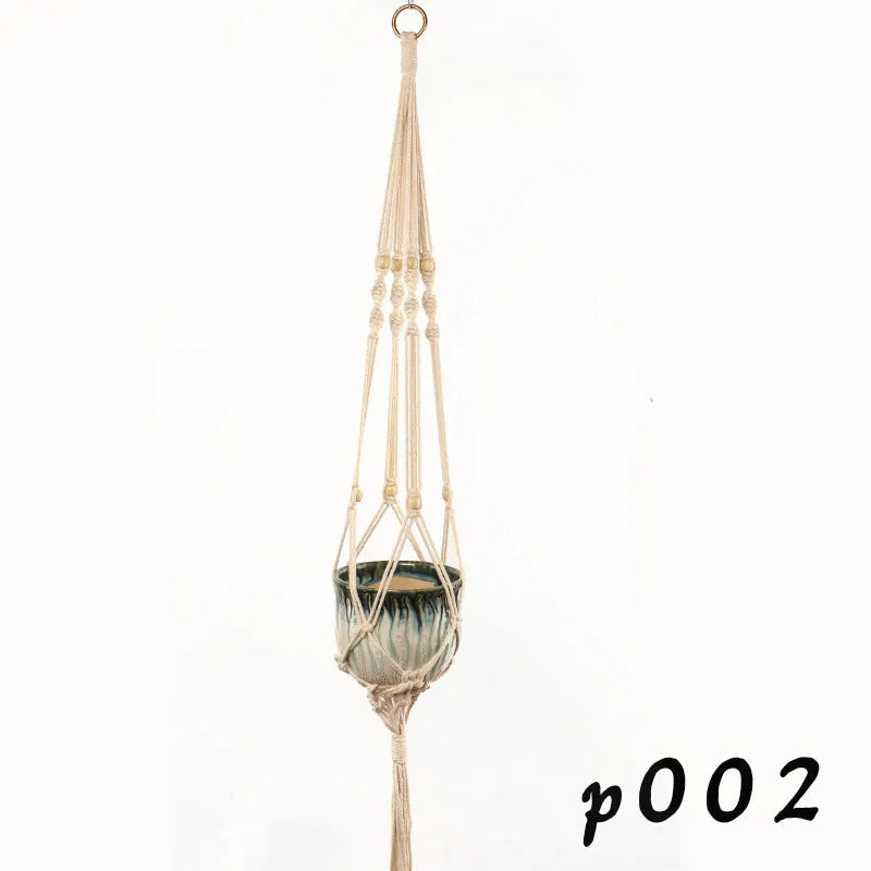 Natural jute cotton rope woven macramé plant hanger in a layered design for wall or ceiling hanging.