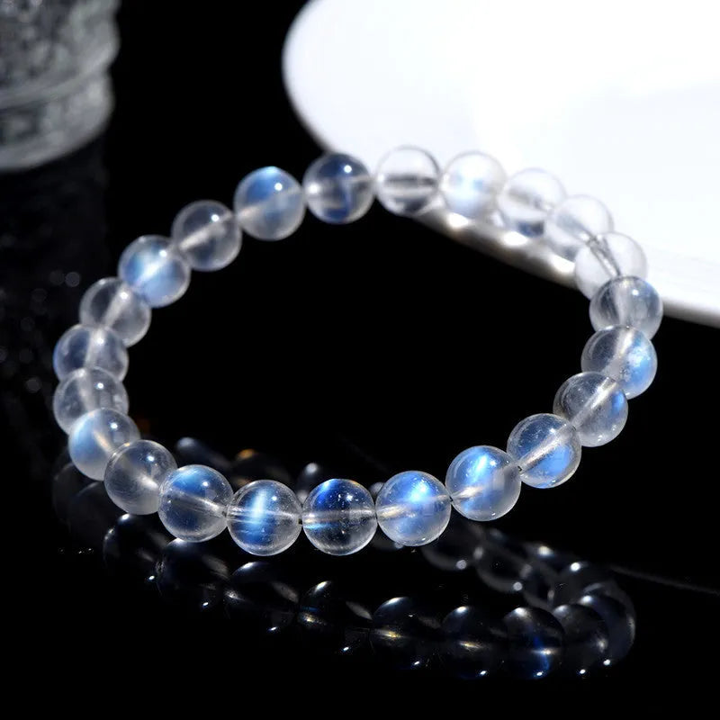 Natural cream body crystal bracelet on wrist showing smooth ground beads.