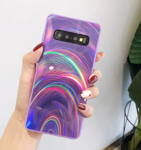 Marble pattern silicone phone case for Samsung Galaxy smartphone on a table.