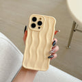 iPhone 17 Pro Max case with electroplated wave stripe pattern on a black TPU back cover.