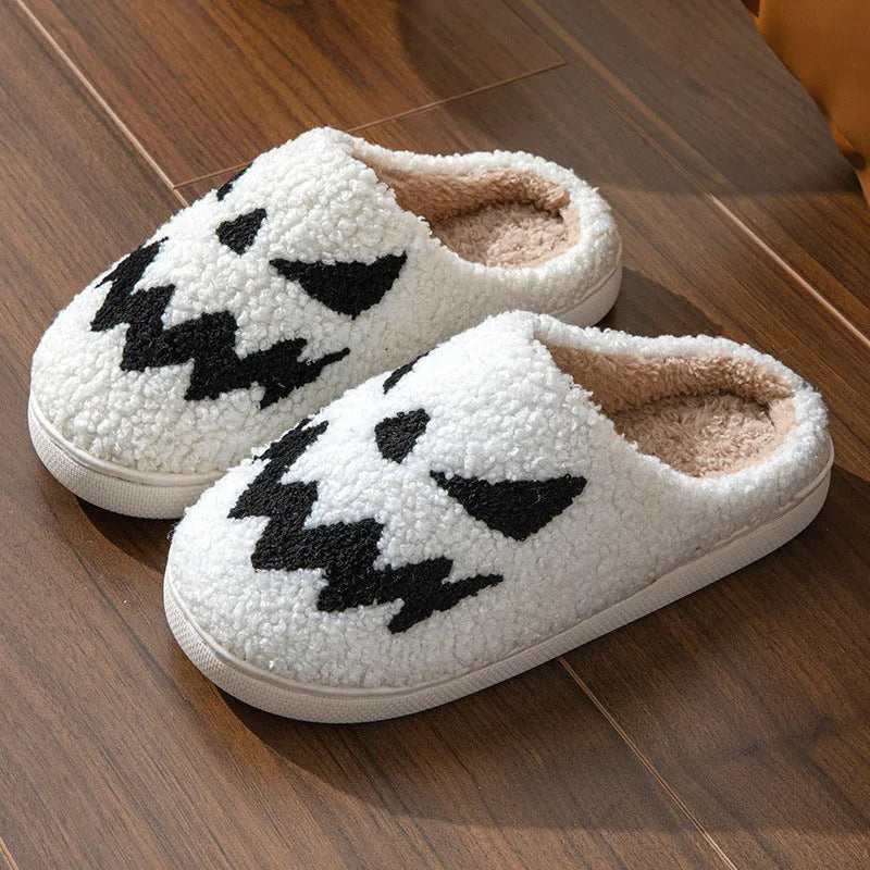 Halloween couple indoor slippers with embroidered lightning ghost face on suede upper in various colours.