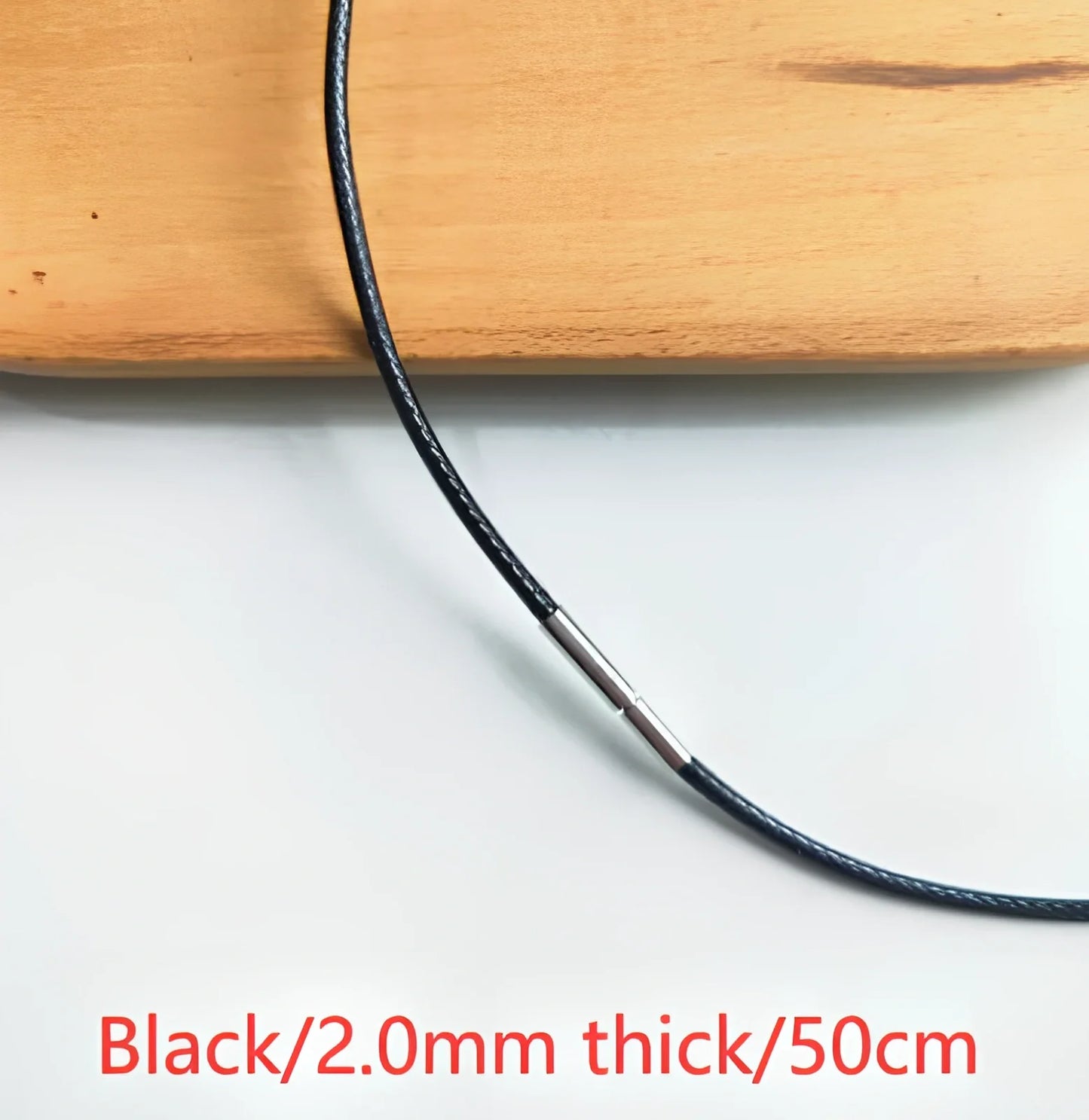 Crystal fishtail necklace with carved whale tail pendant measuring 2.0mm thick on 50cm lanyard