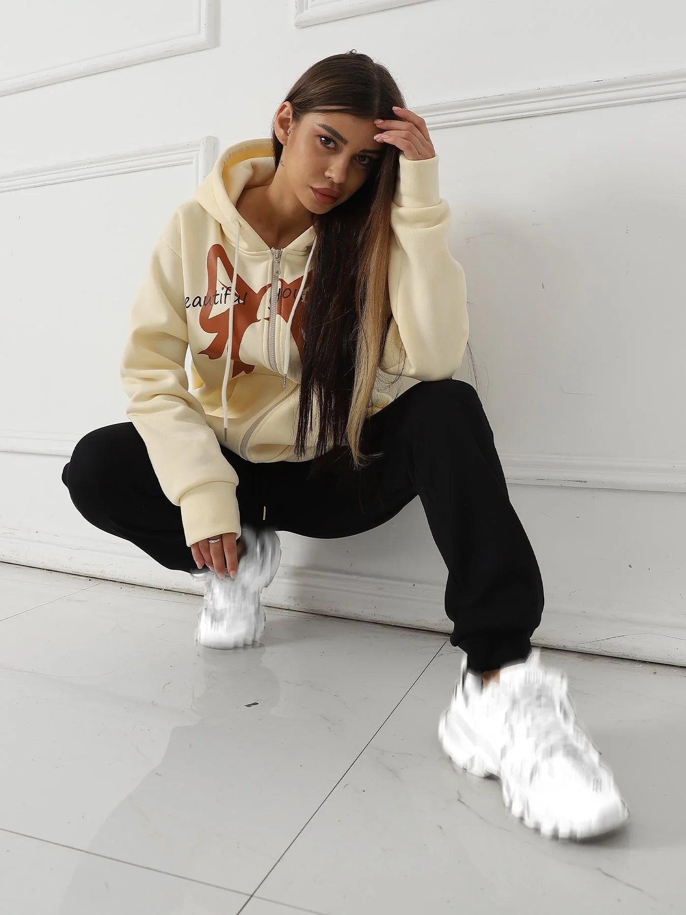 Women's long sleeved sweatshirt in apricot and brown, sizes S to XXL