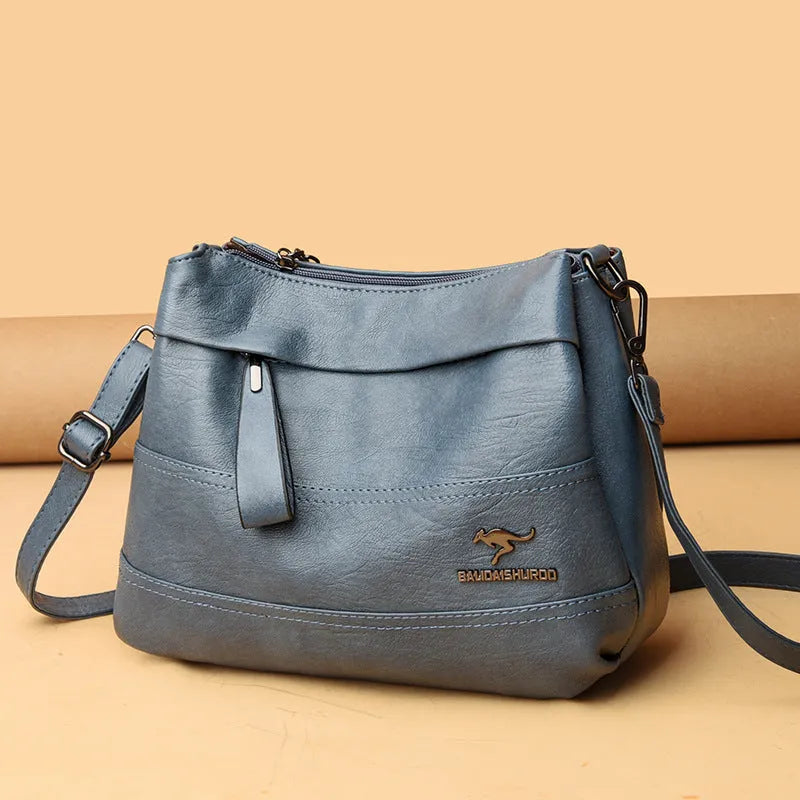 Women's PU leather shoulder messenger bag with double straps, splicing detail, available in multiple colours including yellow and black