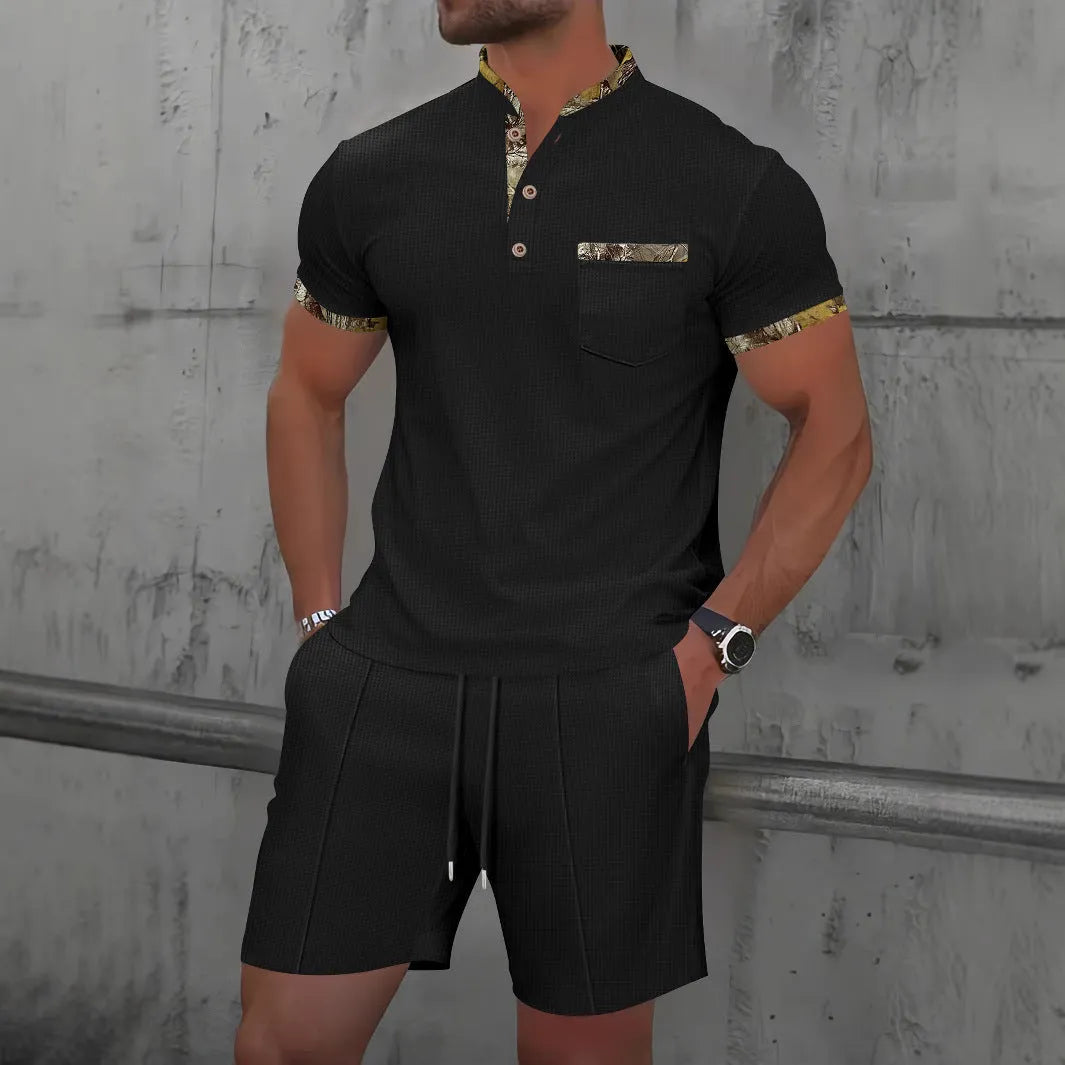 Man wearing a grey waffle-texture zip polo and matching shorts from a cotton blend summer suit set.