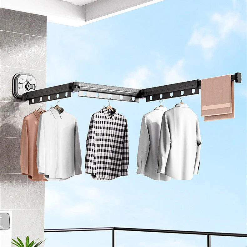 Aluminum retractable clothes drying rack mounted on wall with suction cups