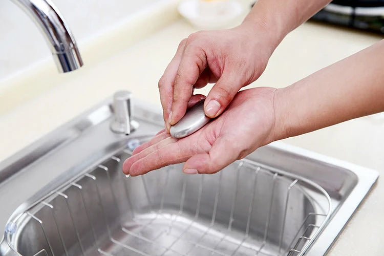Oval stainless steel soap for removing kitchen odors from hands
