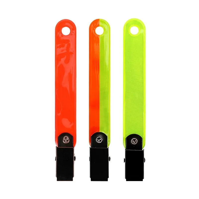 Yellow PVC road sign clip for archery target ribbon marking, size 10.3 cm, on a range background
