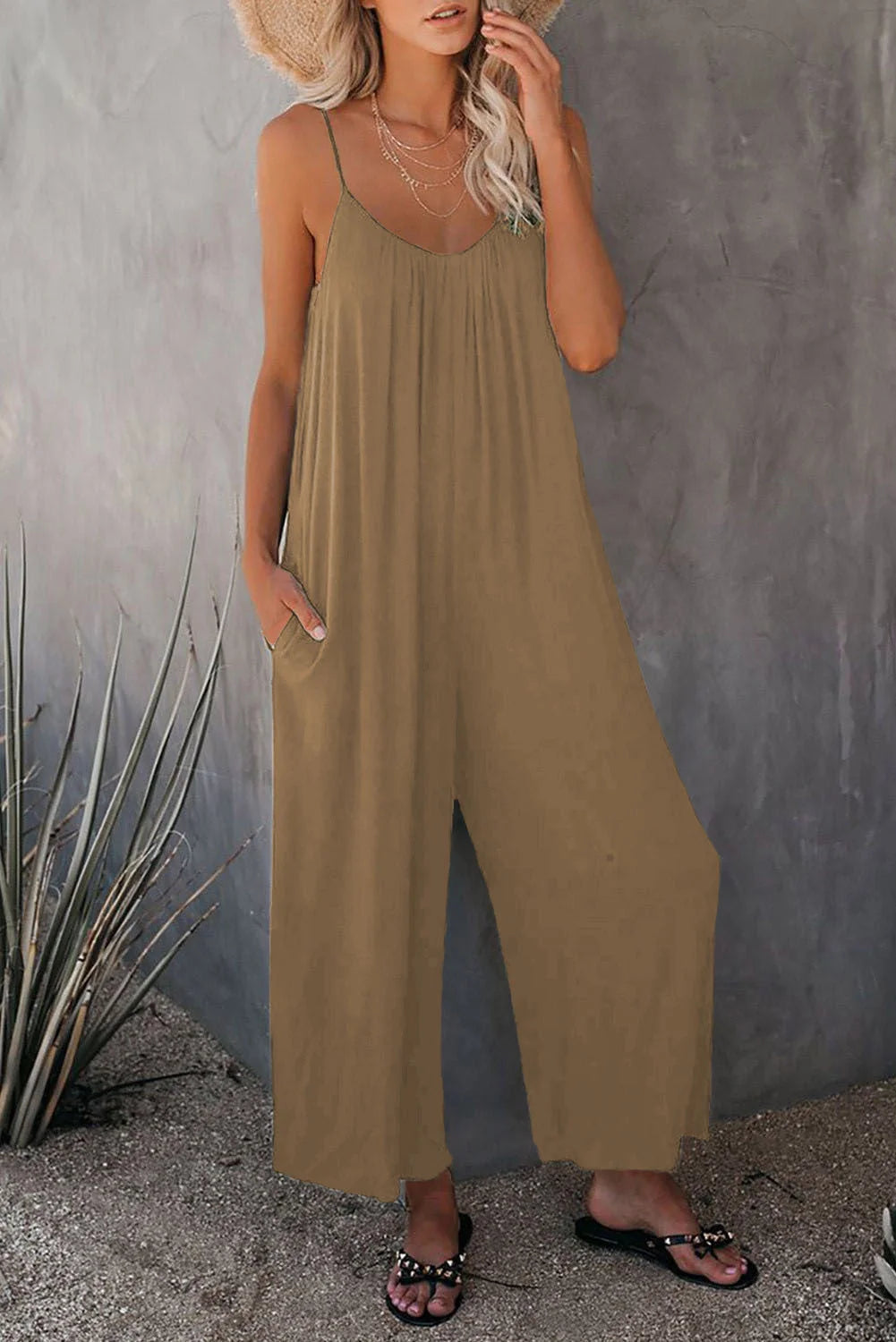 Women's sleeveless cotton blend jumpsuit with pockets, available in multiple colours