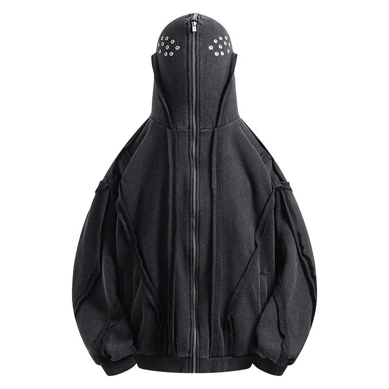 Black loose-fit padded cotton cardigan with a zip front and hood on a model.