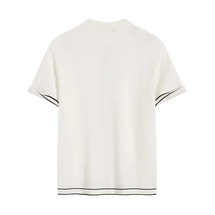 White short sleeve cardigan with contrasting colour lapels and collar on a model.