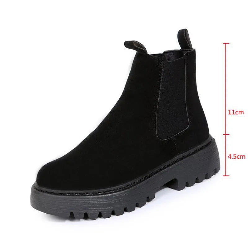 Women's Martin boots in solid colour with chunky platform sole, flat heel, and leather stitching