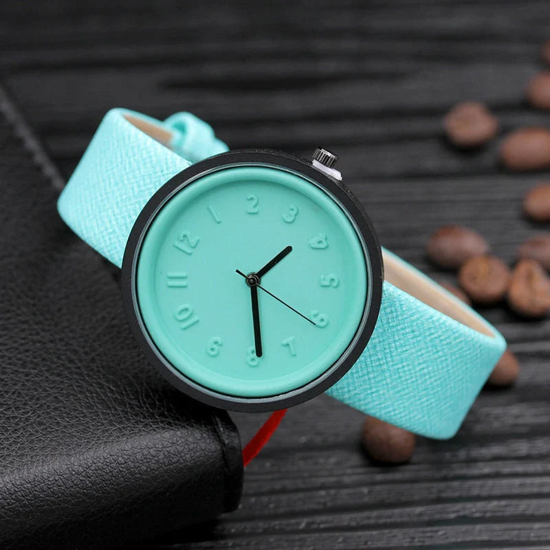 Creative ladies quartz watch with various color options, featuring a PU leather strap and mineral glass mirror