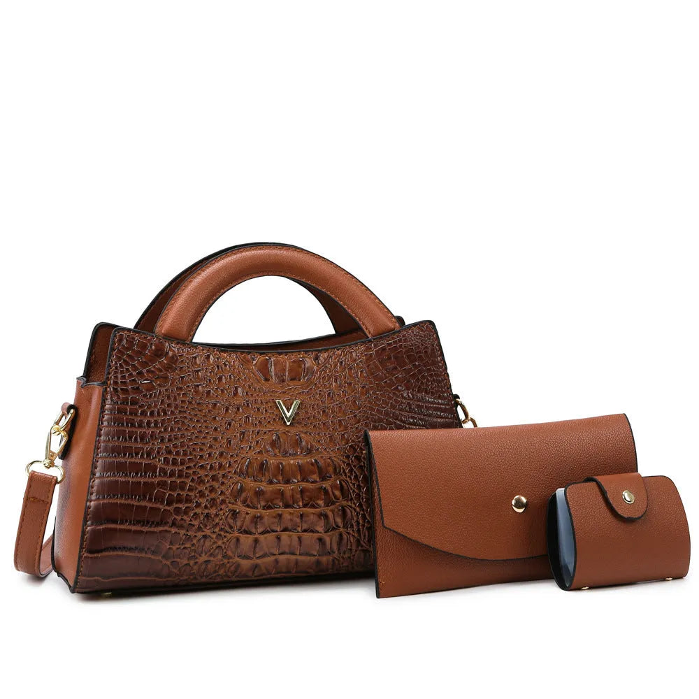 Women's crossbody handbag in crocodile pattern PU leather showing internal organisation compartments