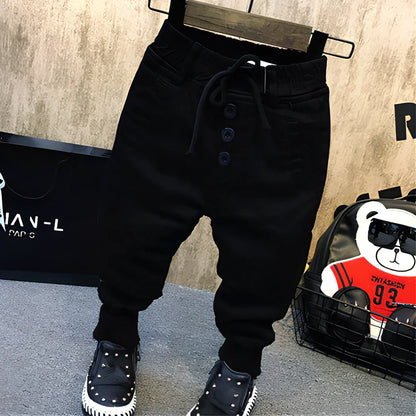 Boy's black velvet-lined winter jeans with 80% cotton composition and five size options