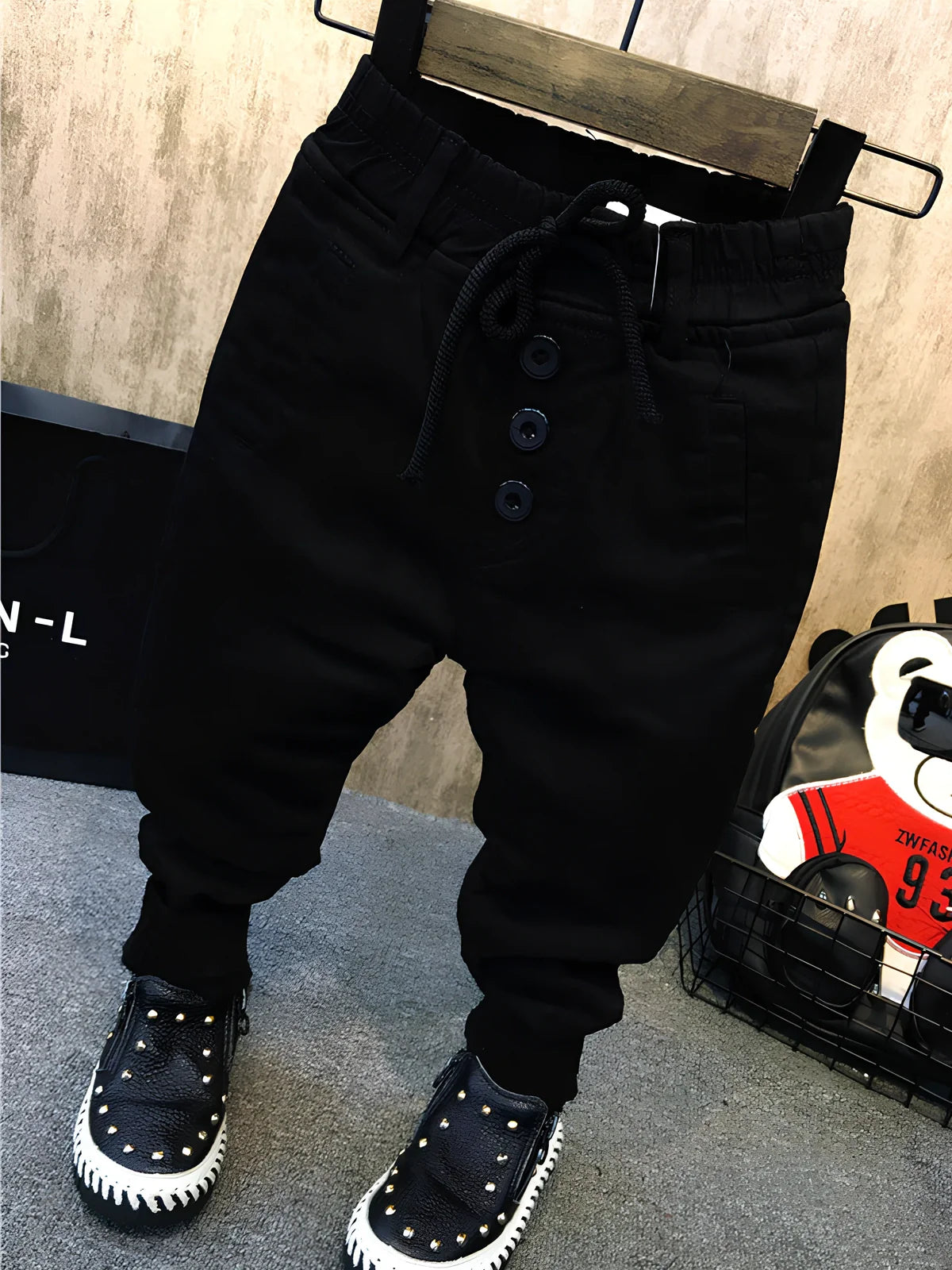 Boy's black velvet-lined winter jeans with 80% cotton composition and five size options