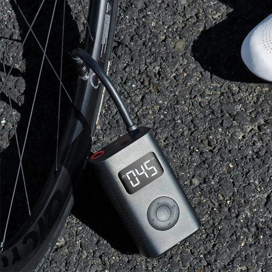 Mijia Mini Portable Car Air Pump with digital display and compact design