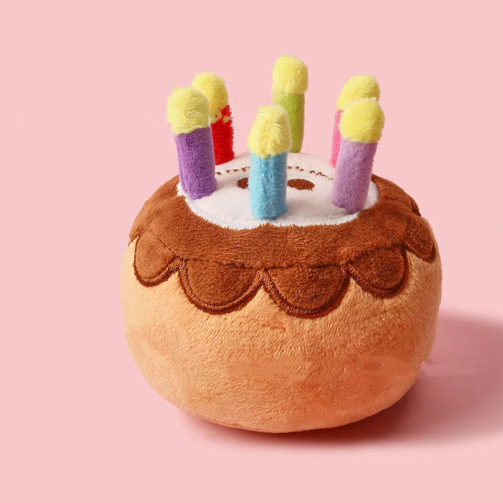 Brown pet plush toy shaped like a birthday cake with a candle, 40g, for dogs to chew and play