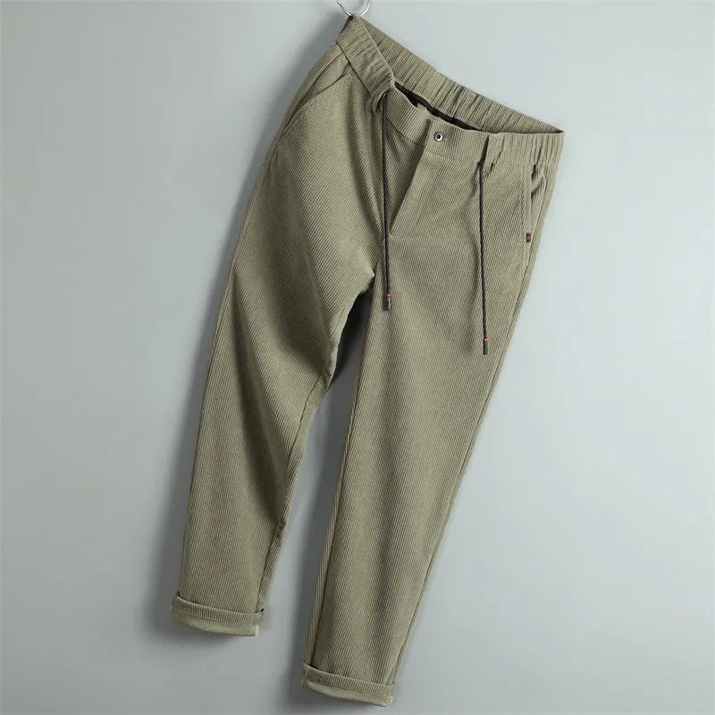 Men's casual striped polyester trousers in black, size 30, front view