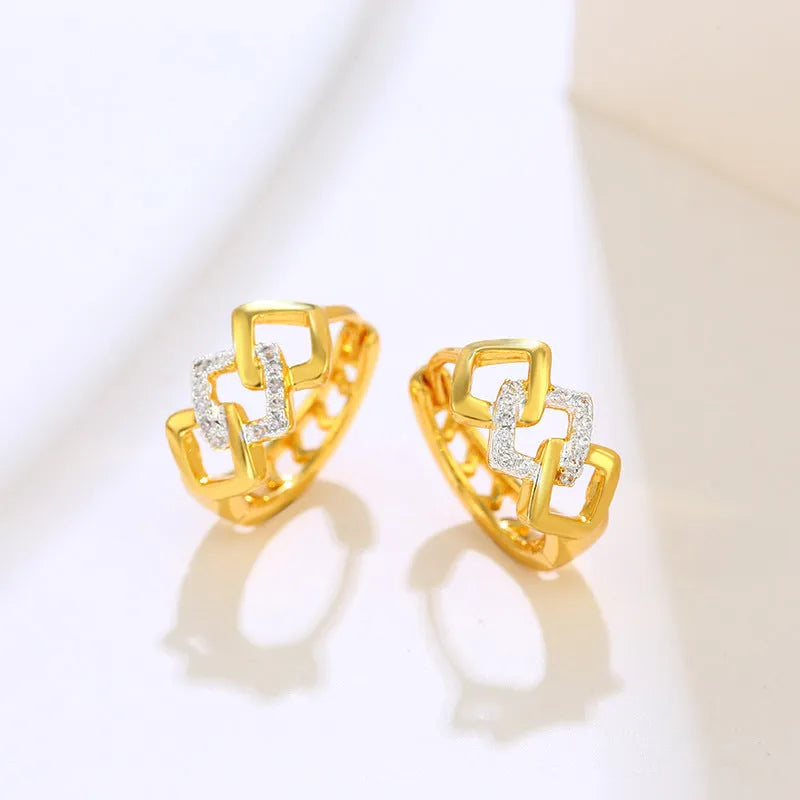 Gold geometric hollow-out earrings with colour separation detail and simple electroplated design