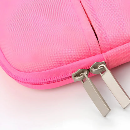 Grey laptop sleeve for MacBook with ant cloth exterior and soft handle, showing internal plush lining