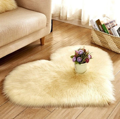 Soft, plush heart-shaped rug in various colors and sizes for comfortable home decor