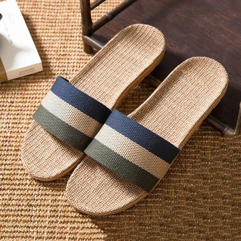 Linen open-toe home slippers with EVA sole in woven blue colour on a light background