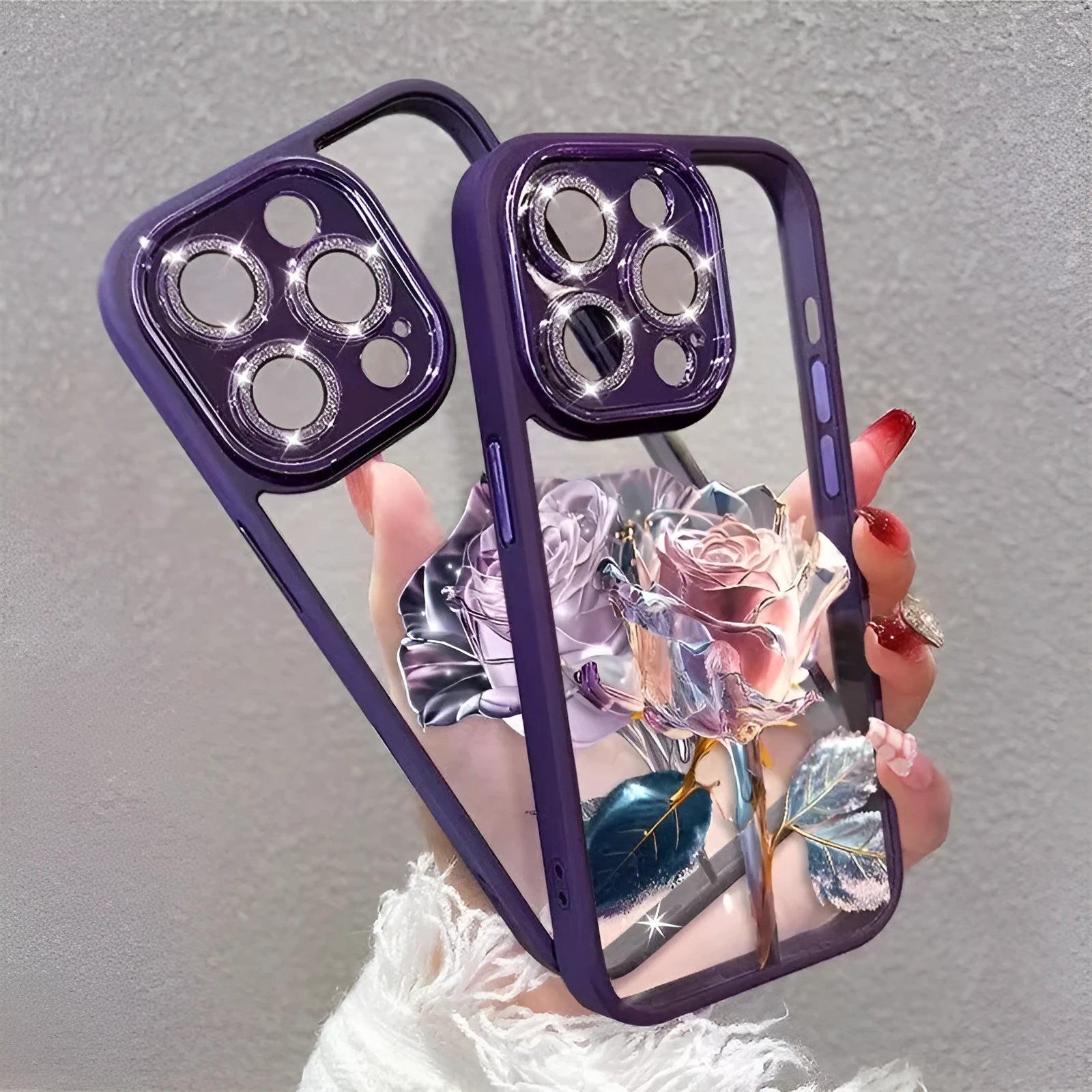 Dark purple fairy pink rose TPU iPhone case with sparkling pink lens film on an iPhone 14 Pro.