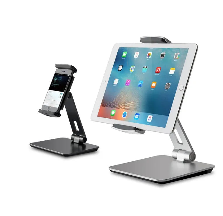Silver aluminium foldable desktop stand holding a tablet, showing 360-degree rotation.