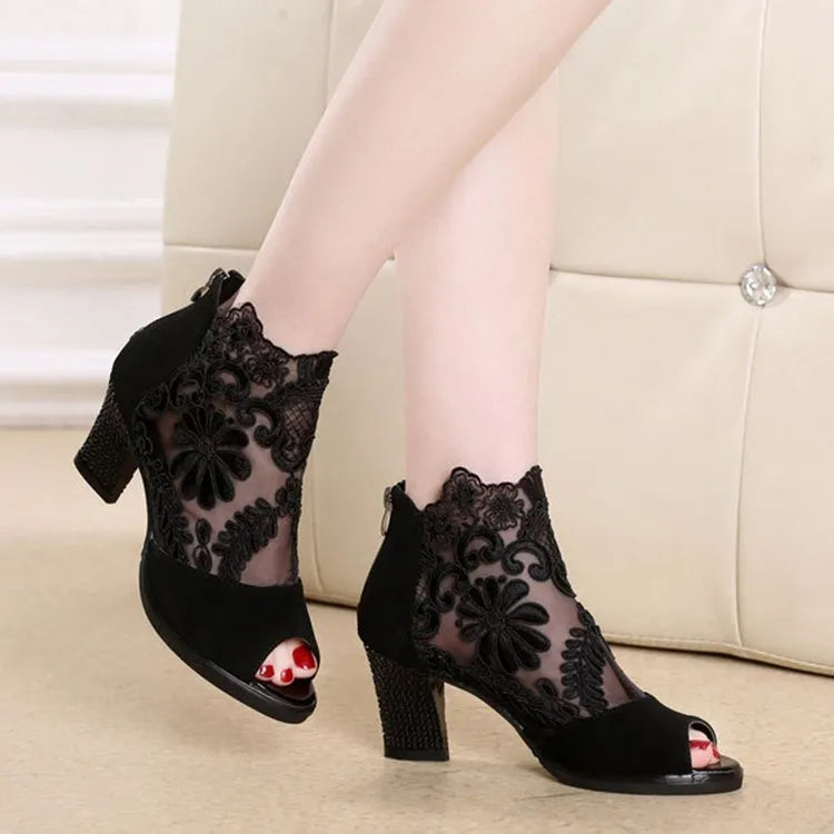 Women's black lace gladiator sandals with square high heel and zip closure side view