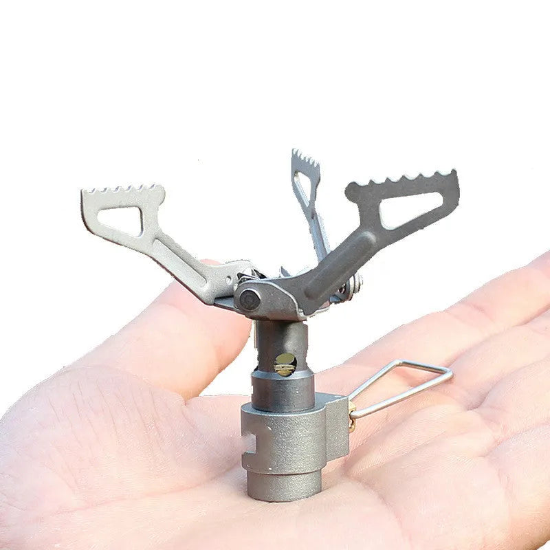 Single-piece portable propane gas camping stove for outdoor use.