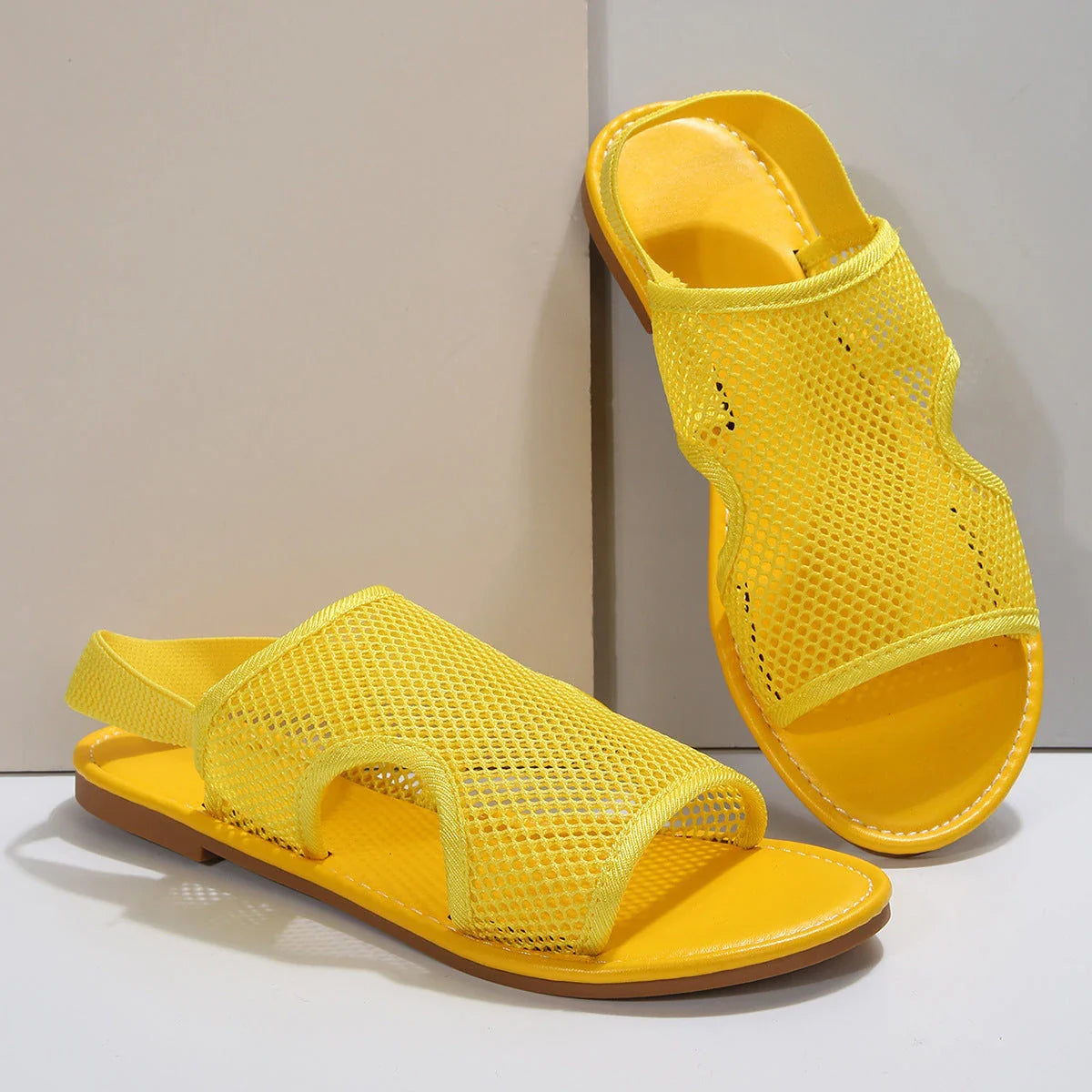 Breathable mesh sandals in various colors, perfect for summer beach and casual wear