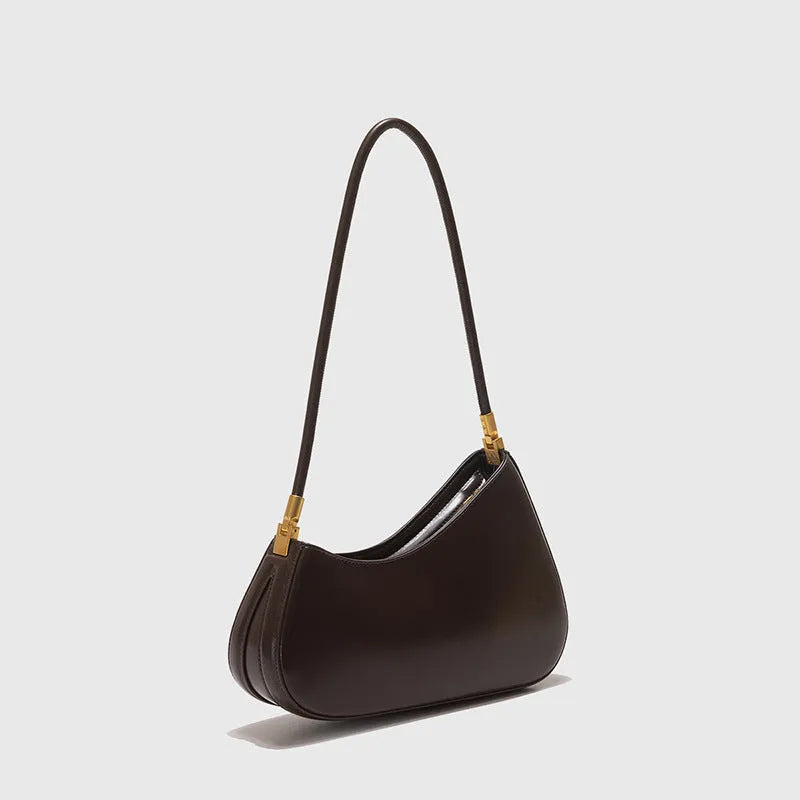 Women's oval-shaped retro underarm bag in various colours with a single shoulder strap.
