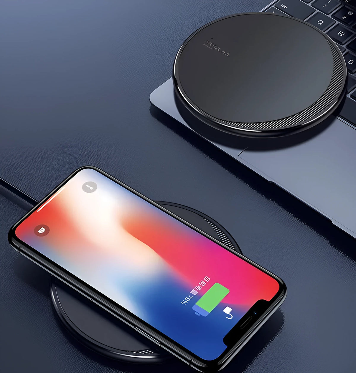 Black Kuulaa wireless disc phone charger with Micro USB port and LED indicator light