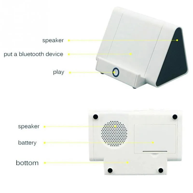 A small black or white wireless Bluetooth speaker for mobile phones and computers