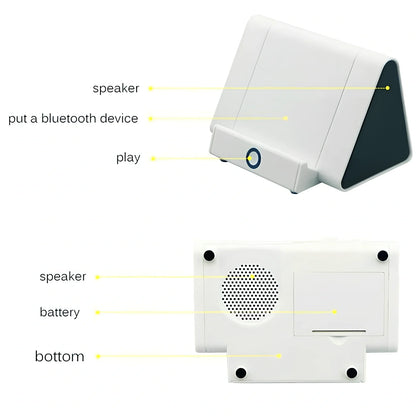 Compact black wireless Bluetooth speaker with micro-USB charging port and touch controls