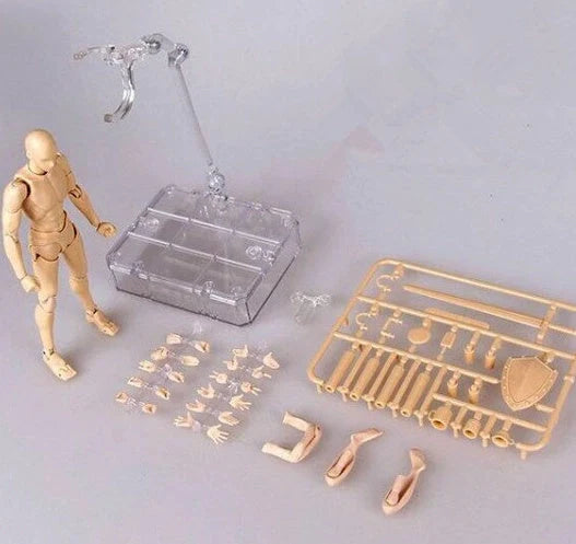 Articulated human mannequin kits for artists with interchangeable accessories