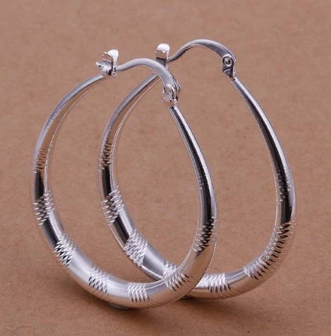 Silver-plated copper hoop earrings with 925 silver treatment, 3.9cm by 3.2cm